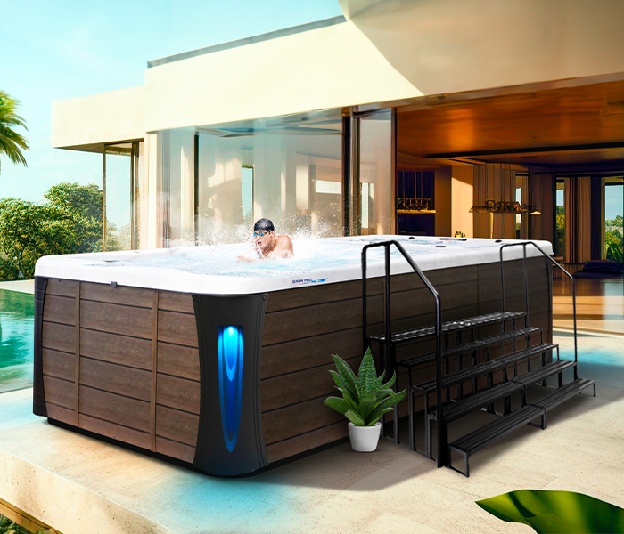 Calspas hot tub being used in a family setting - Wellington